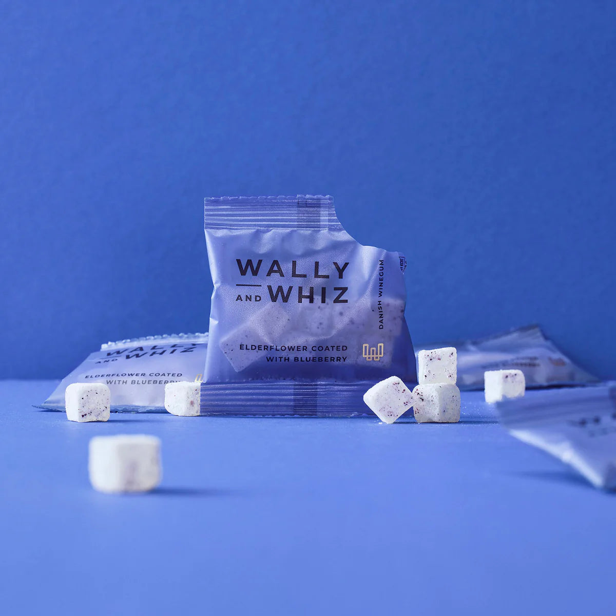 HYLDEBLOMSTVINGUMMI DRYSSET MED BLÅBÆRPULVER - POSE 11 G - WALLY AND WHIZ